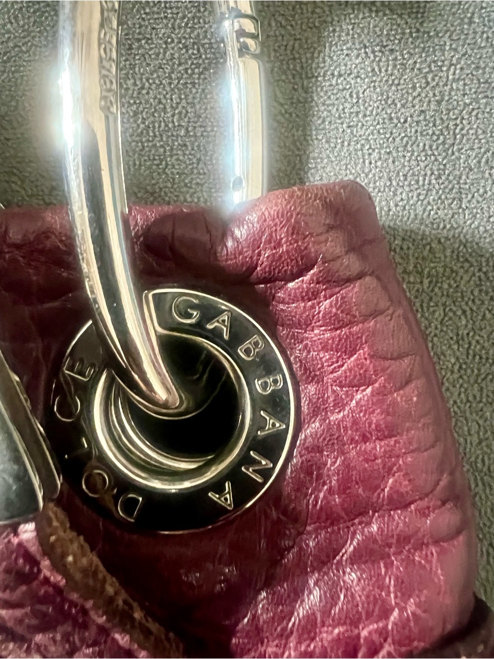 Dolce and Gabbana plum pebbled leather shoulder bag with silver hard ware. - Picture 2 of 14